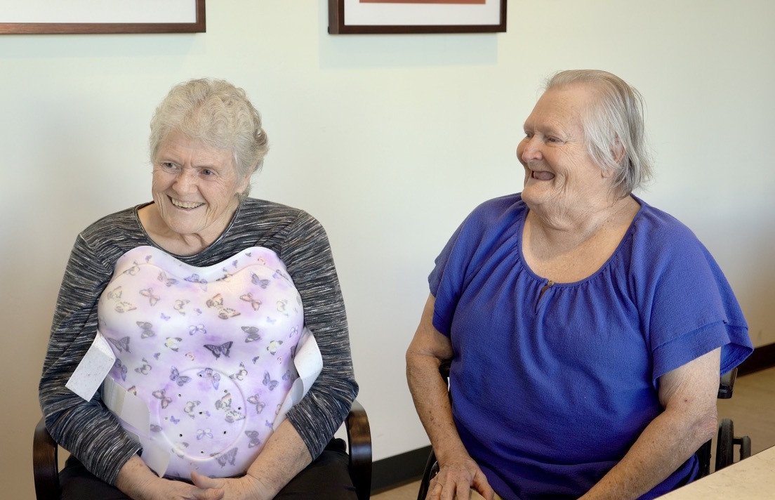 Duet homebound seniors smiling